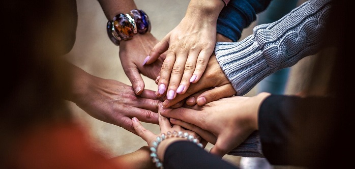 People-in-circle-holding-hands